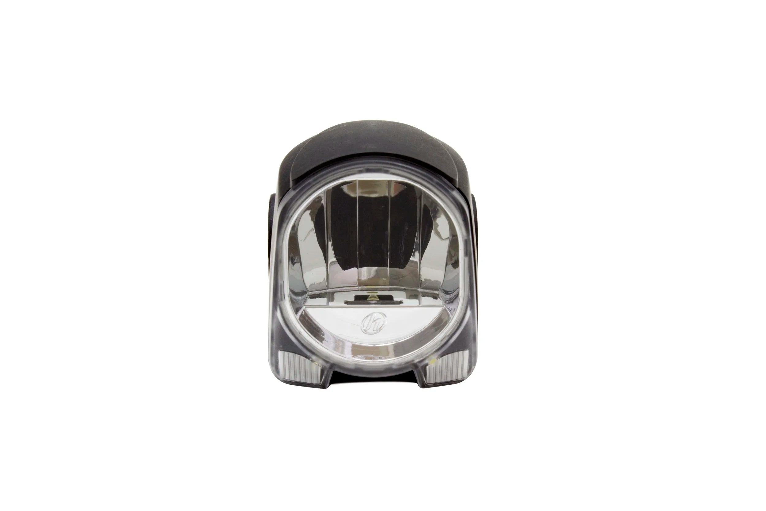 Close-up of a bicycle light with a reflective surface on a white background