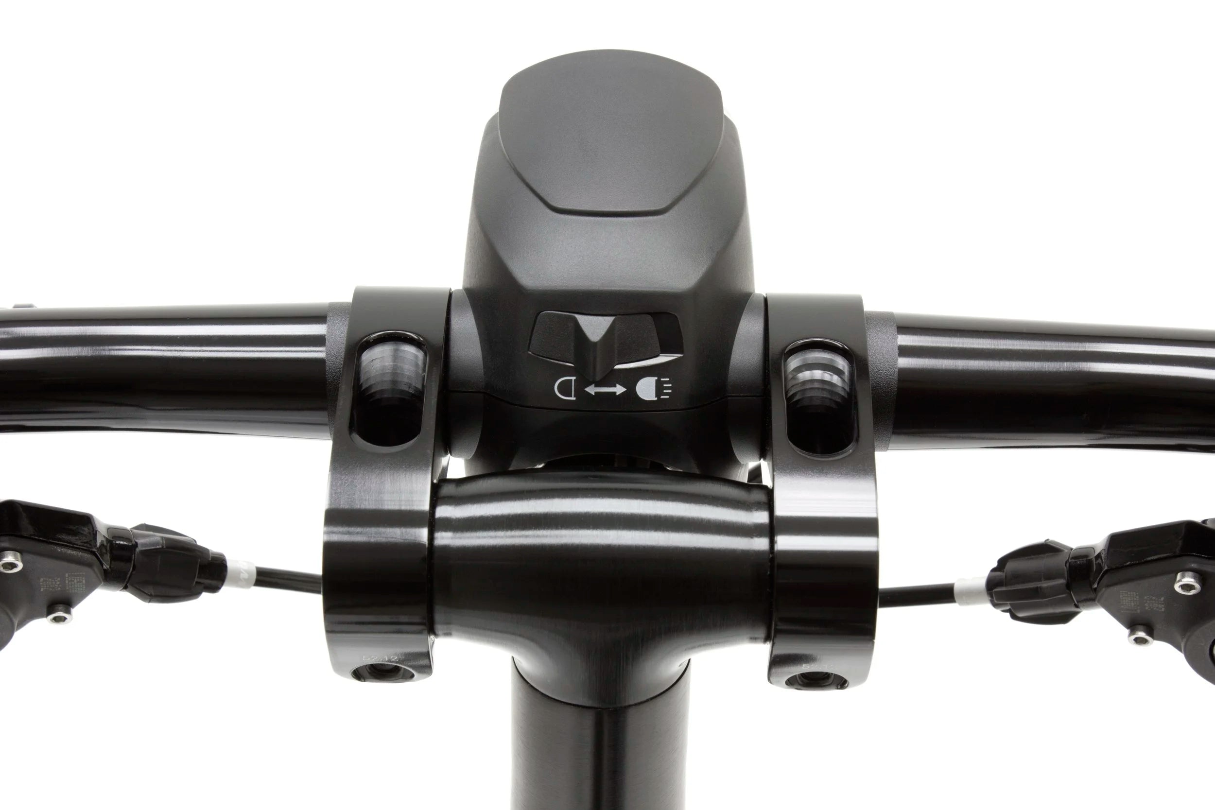 Close-up of a bicycle handlebar with control buttons on a white background