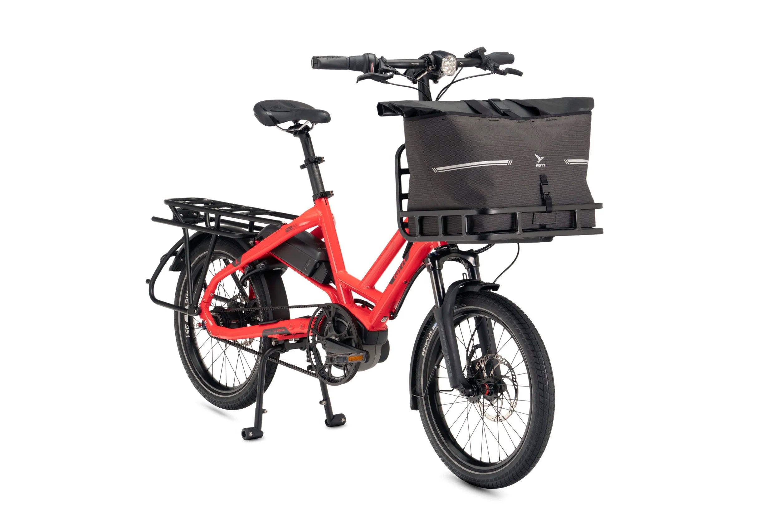 Red cargo bike with a black basket on a white background
