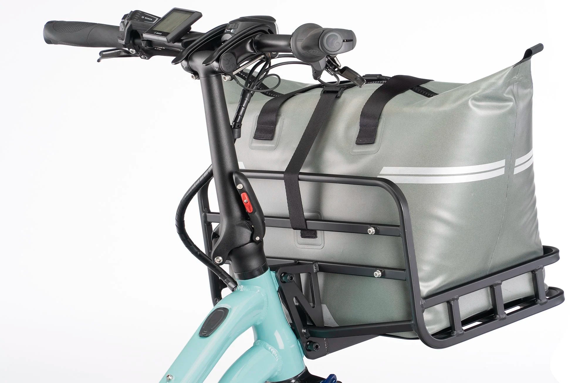 Bicycle with a gray bag attached to the front rack on a white background