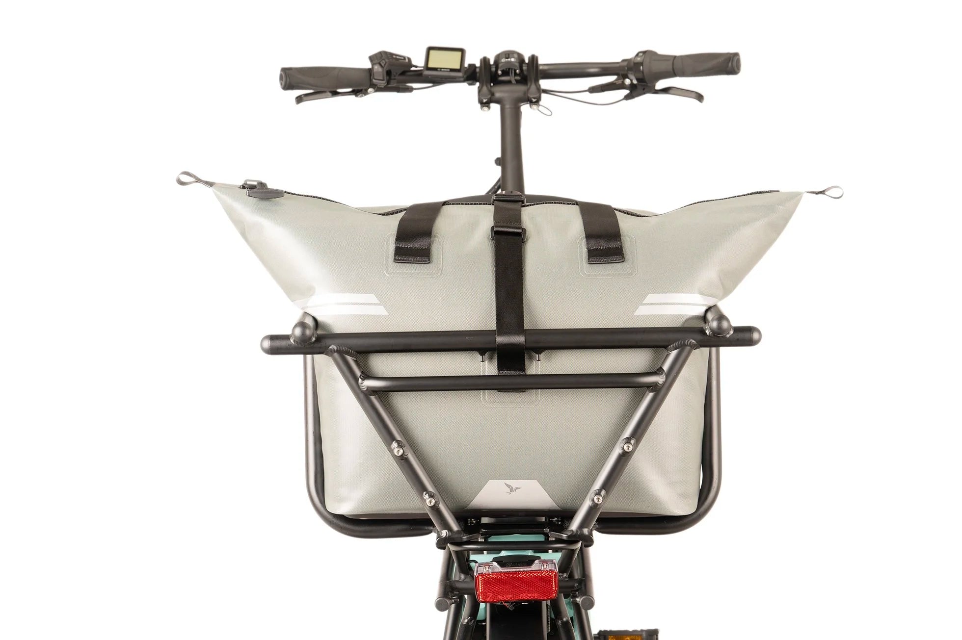 Bicycle with a large grey  front storage bag on a white background