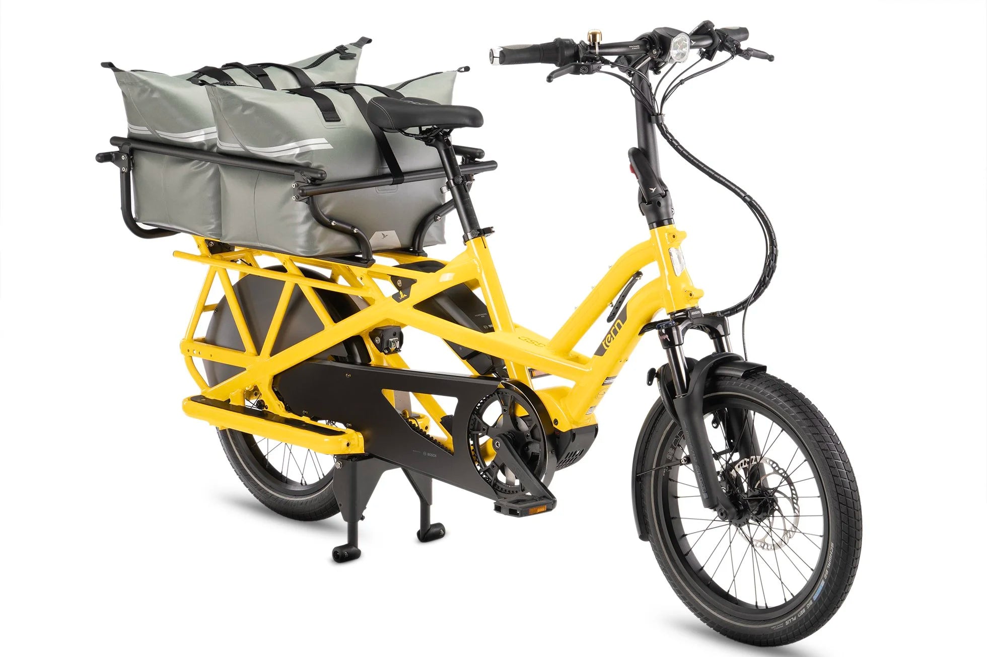 Yellow Tern cargo bike with gray storage baskets on a white background