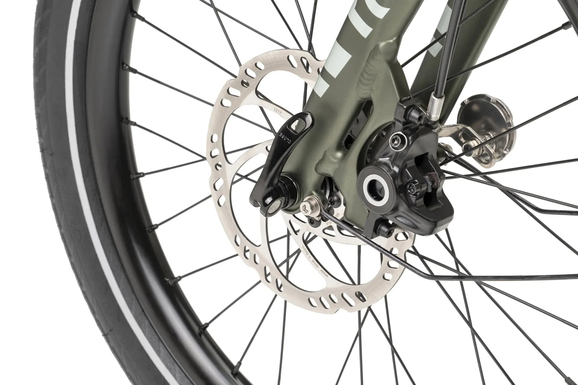 Close-up of a Tern bicycle front wheel with disc brake system on a white background