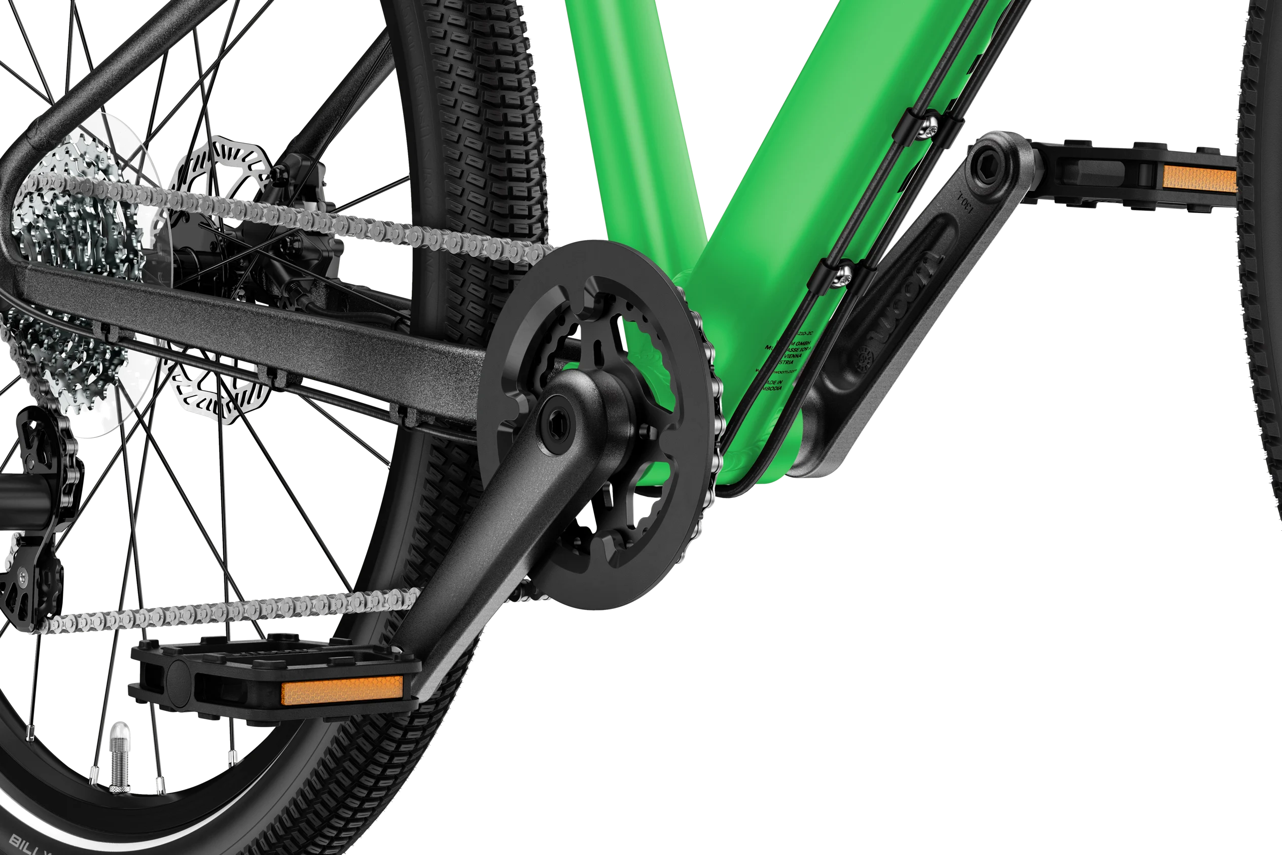 Close-up of a green bicycle frame with chain and gears on a white background