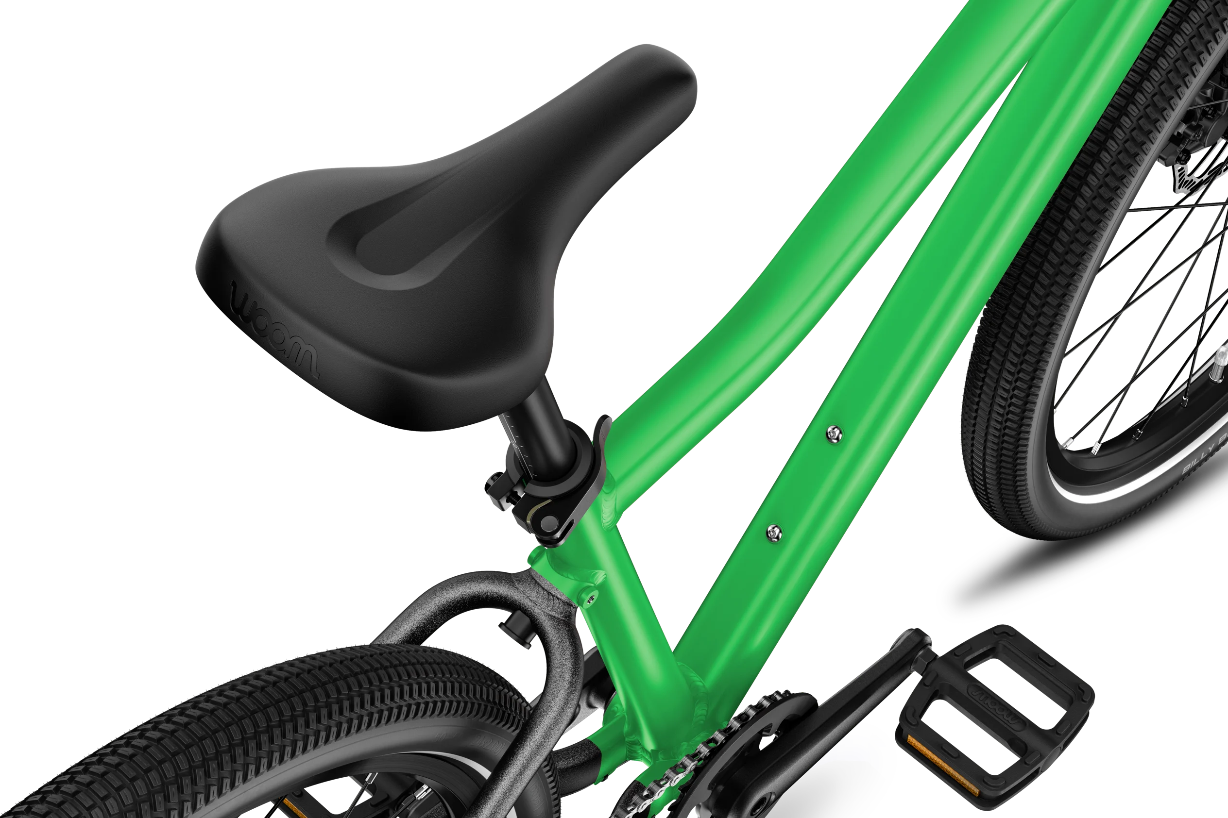 Close-up of a green bicycle frame with a black seat and pedal on a white background