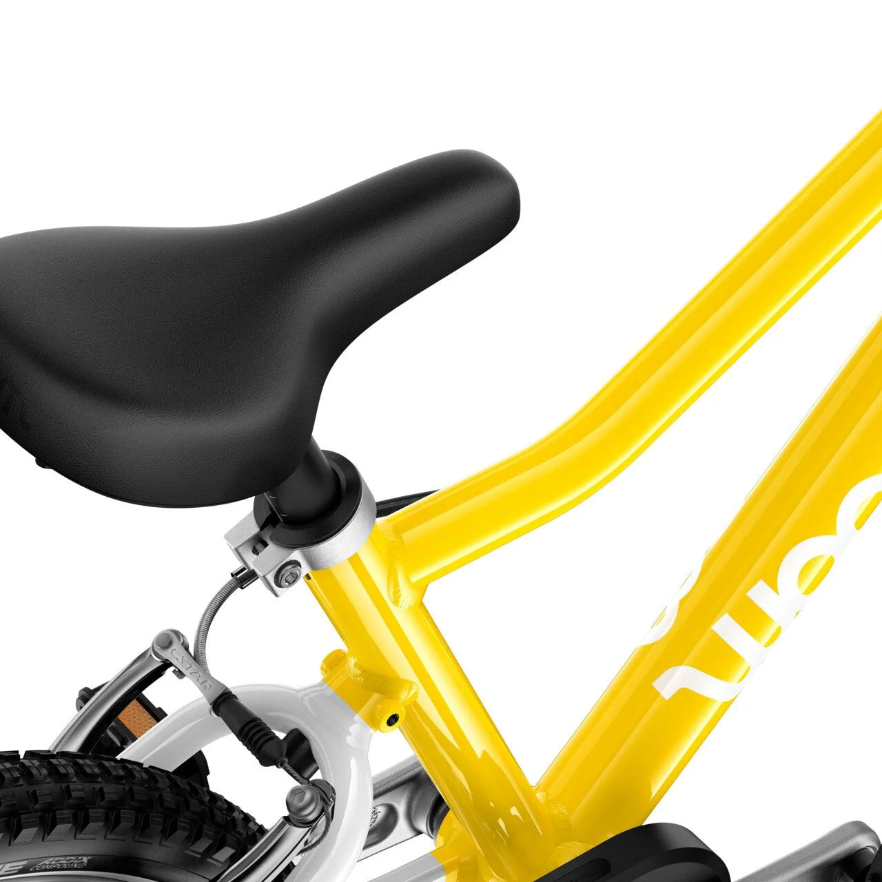 Close-up of a Woom yellow bicycle frame with a black seat on a white background