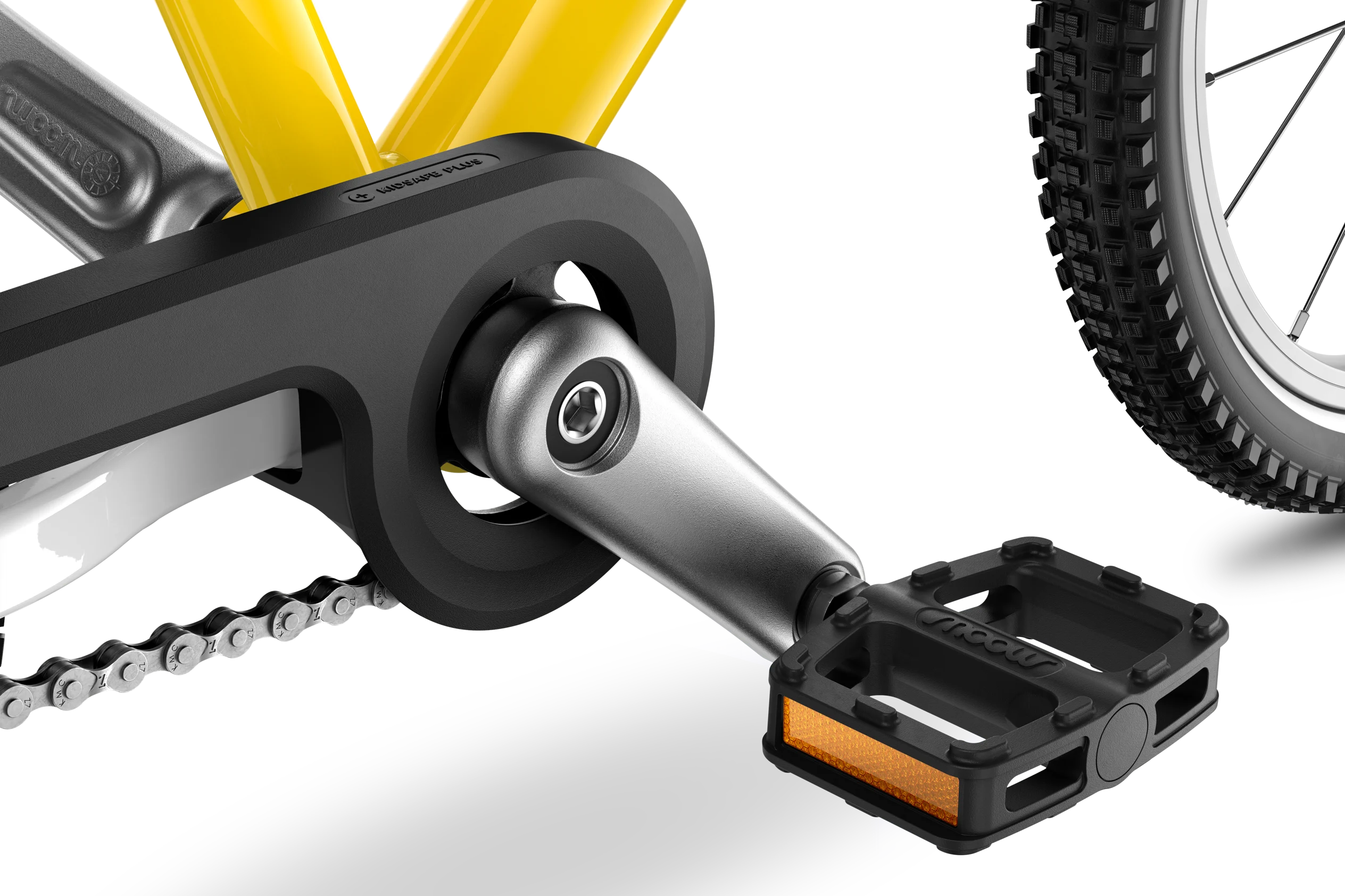 Close-up of a bicycle pedal and chain mechanism with a yellow bike frame in the background.