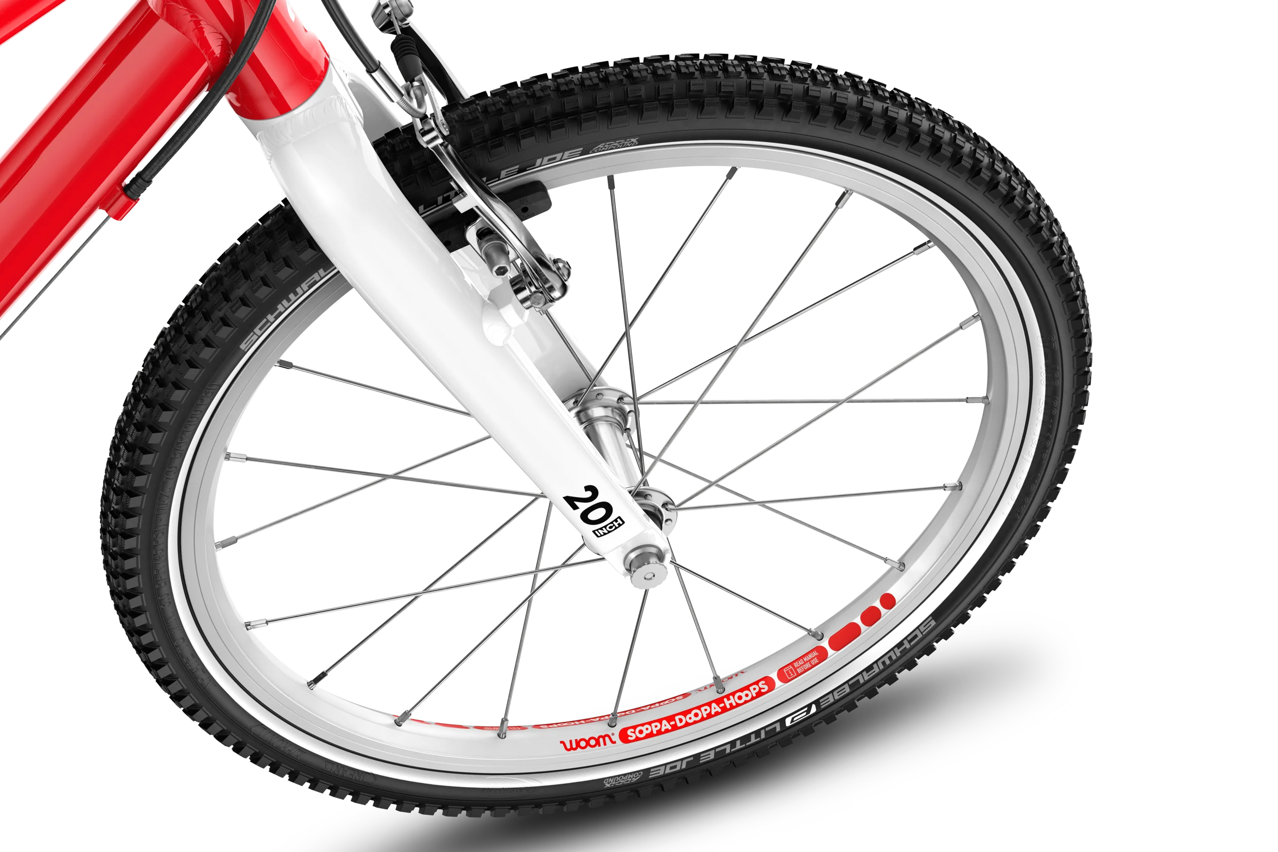 Close-up of a Woom bicycle wheel with a silver rim and silver spokes on a white background