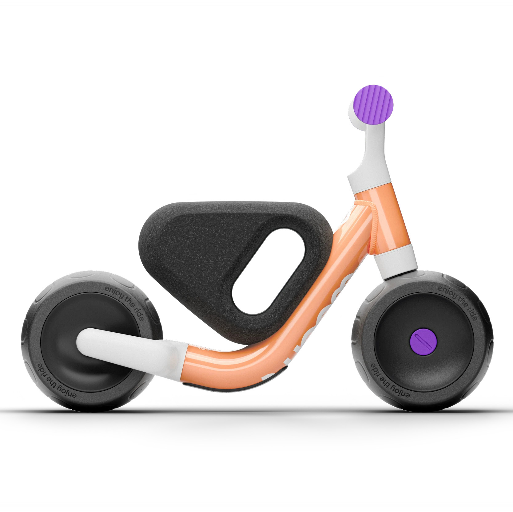 Children's balance bike with orange frame, black seat, and purple accents on a white background