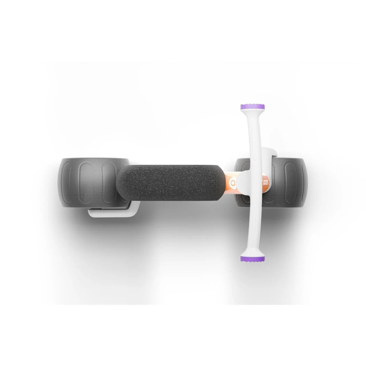 White and peach Woom balance bike with black seat and purple accents on a white background