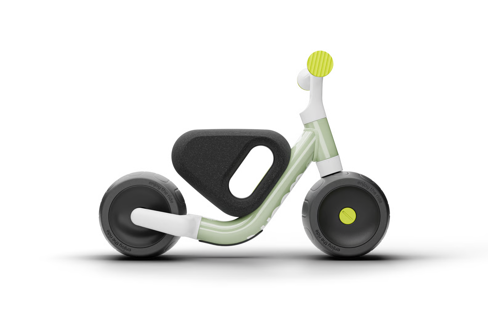 Children's Woom balance bike with green frame and black seat on a transparent background