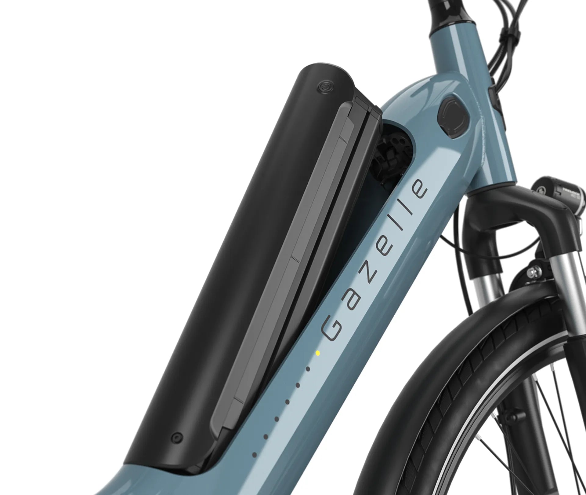 Close-up of a battery on a blue electric bike with 'Gazelle' branding on a white background