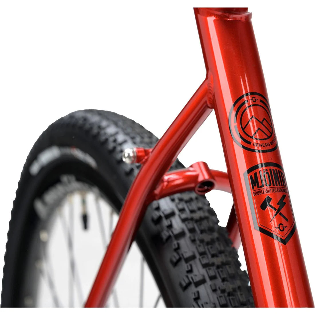 Close-up of a red bicycle frame with visible branding on a white background
