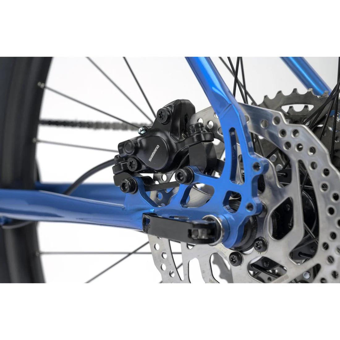 Close up of a Shimano hydraulic brakes with a blue bicycle frame on a white background