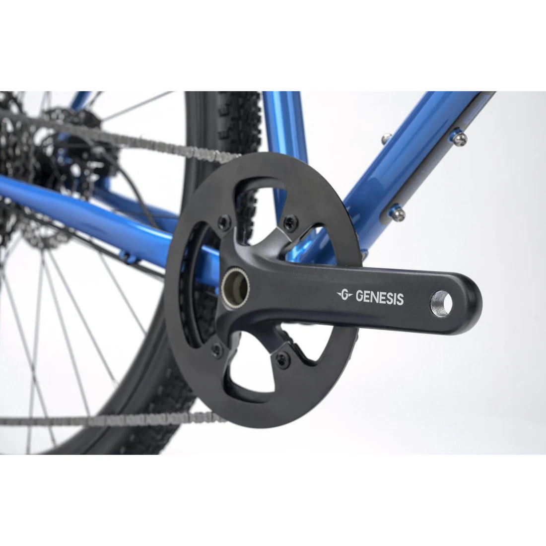 Close up of bicycle frame and crank on a white background.