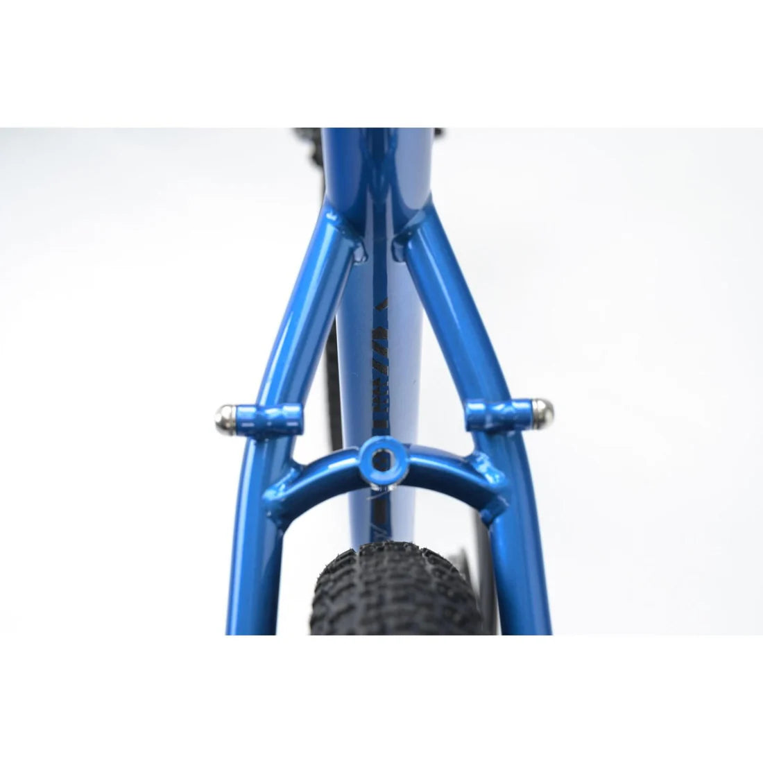 Close up of a blue bicycle frame on a white background