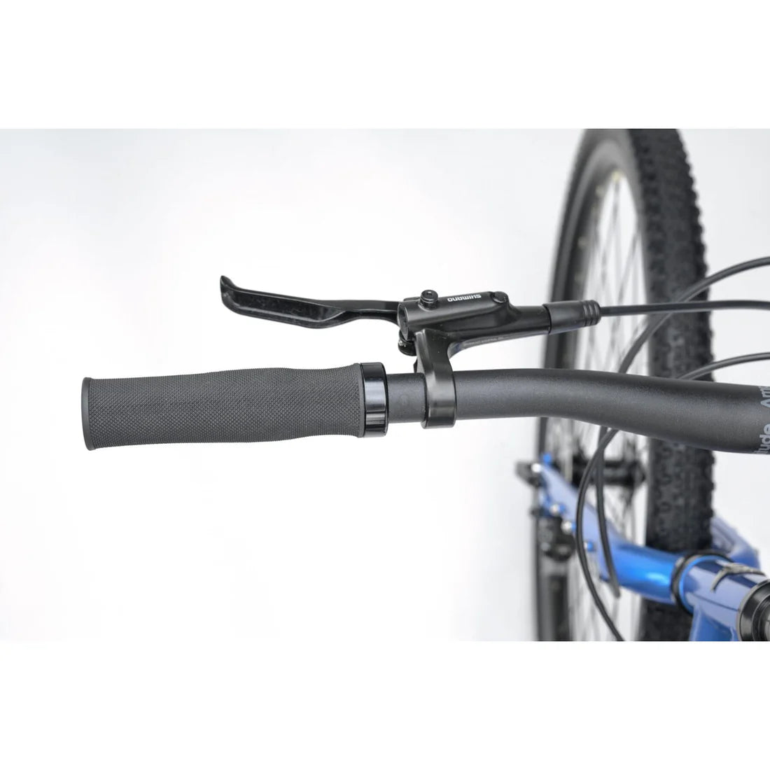 Close up of a black handlebar with Shimano brake liver on a white background