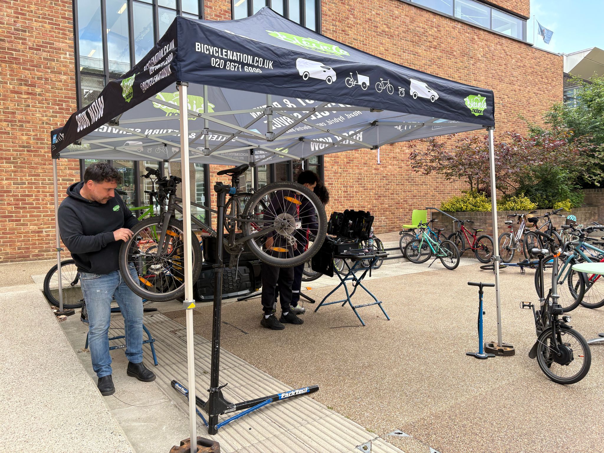Bicycle repair done by bicycle mechanics. 